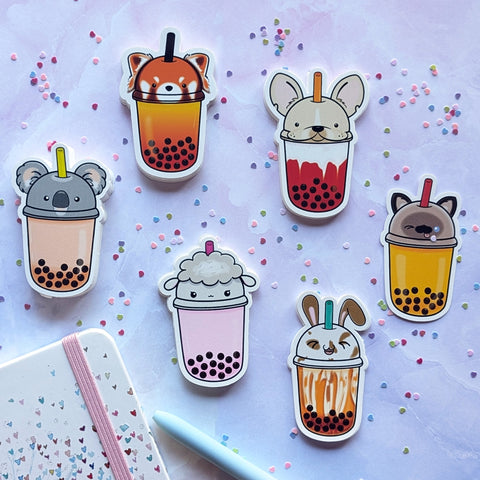 Kawaii bubble tea vinyl stickers with animal themed lids including red panda, French bulldog, Siamese cat, bunny, sheep, koala.  Original design by Bare It Designs Ltd. Printed in Canada.