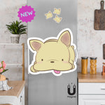 Product picture of a cute French Bulldog fridge magnet with a background example of the Frenchie magnets clinging to a stainless steel fridge. French Bulldog magnet is designed by Bare It Designs.