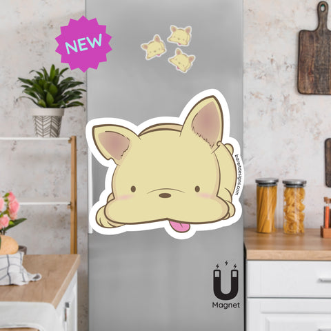 Product picture of a cute French Bulldog fridge magnet with a background example of the Frenchie magnets clinging to a stainless steel fridge. French Bulldog magnet is designed by Bare It Designs.