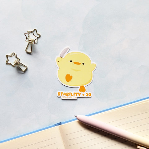 Cute kawaii duck vinyl sticker with the saying "Stability +20 (stab ability)" designed by Bare It Designs from Edmonton, AB, Canada. 