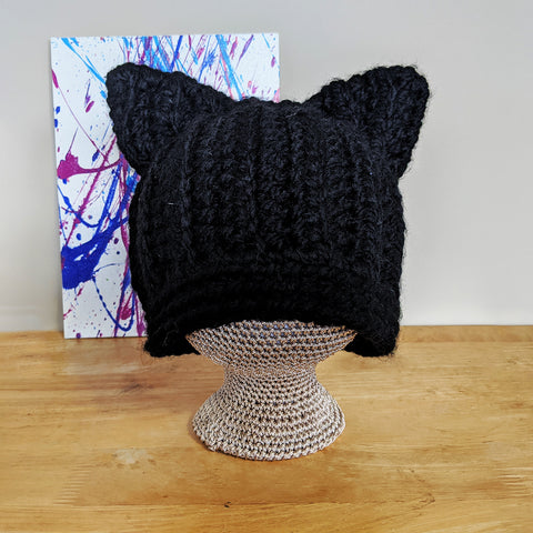 Black colored warm, chunky textured crochet/knit toque featuring cat (animal) ears. Handmade by Bare It Designs Ltd.