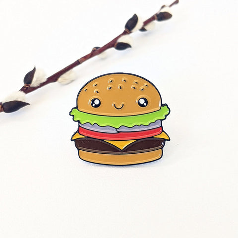 Cute kawaii cheeseburger with eyes and a smile enamel pin by Bare It Designs