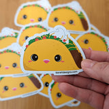 Close up of cute kawaii taco fridge magnet designed by Bare It Designs from Edmonton, AB, Canada. 