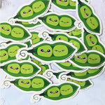 Close up of a cute kawaii peas in a pod fridge magnet designed by Bare It Designs from Edmonton, AB, Canada.