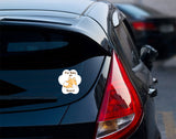 Demonstration of Bare It Designs Fur Baby On Board Docked Corgi decal on the rear windshield of a vehicle.