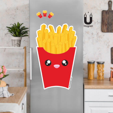 Product picture of a cute flexible fries fridge magnet with a background example of fries magnets clinging to a stainless steel fridge. Fries magnet is designed by Bare It Designs.