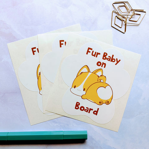 Cute and adorable long tail corgi Fur Baby On Board decals drawn by Bare It Designs in the kawaii art style.