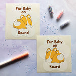 Fur Baby On Board decals drawn by Bare It Designs in the kawaii art style. Top left corner docked tail corgi, bottom right corner long tail corgi.