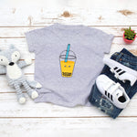 Grey toddler t-shirt with a cute mango bubble tea drink drawing in the kawaii art style. Designed and printed by Bare It Designs.