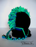 Punk Rocker character crochet toque with ear flaps and braided draw strings. Handmade by Bare It Designs Ltd.