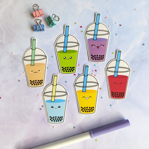 Six different vinyl stickers of different flavors of bubble tea drinks with cute faces made by Bare It Designs.
