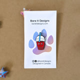 Cute kawaii strawberry bubble tea enamel pin on card backing by Bare It Designs