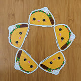 Cute kawaii taco fridge magnet designed by Bare It Designs from Edmonton, AB, Canada. Multiple taco magnets arranged into a pentagon circle scheme.