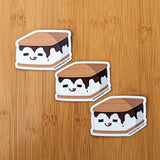 Cute kawaii s'more fridge magnet designed by Bare It Designs from Edmonton, AB, Canada. Three s'more magnets arranged in an descending diagonal line.
